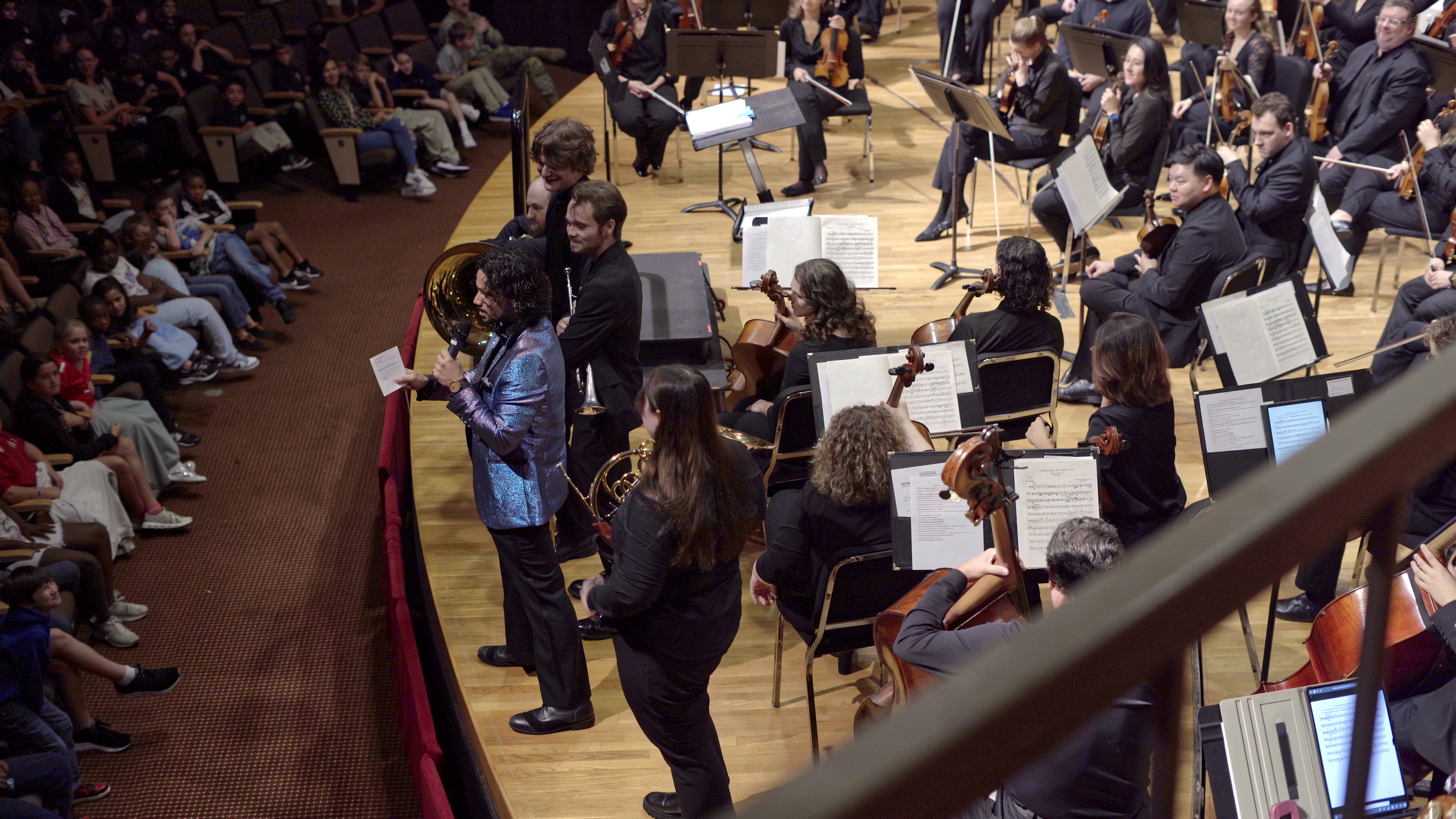 The Valdosta Symphony Orchestra performing for a youth concert audience